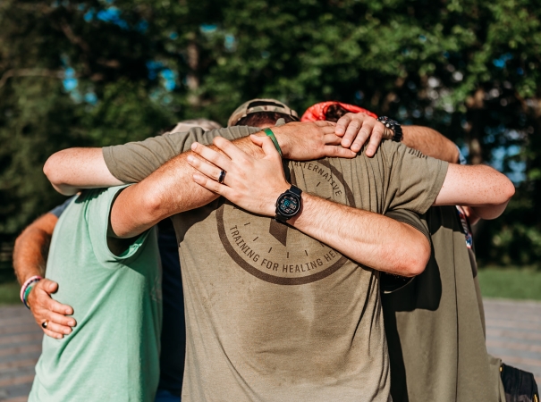 Group of vets hugging